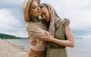 two women comfort